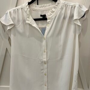 White shirt from Ann Taylor. Polyester. New with tag.